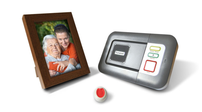 Lifeline Vi Alarm with MyAmie Pendant Button and family photograph