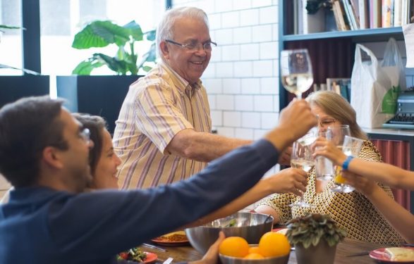 elderly person enjoying a nutritional meal with family
